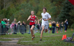 Jared races to the 5k finish (Bib # 17727) at the Don Olson Classic in 20th place.